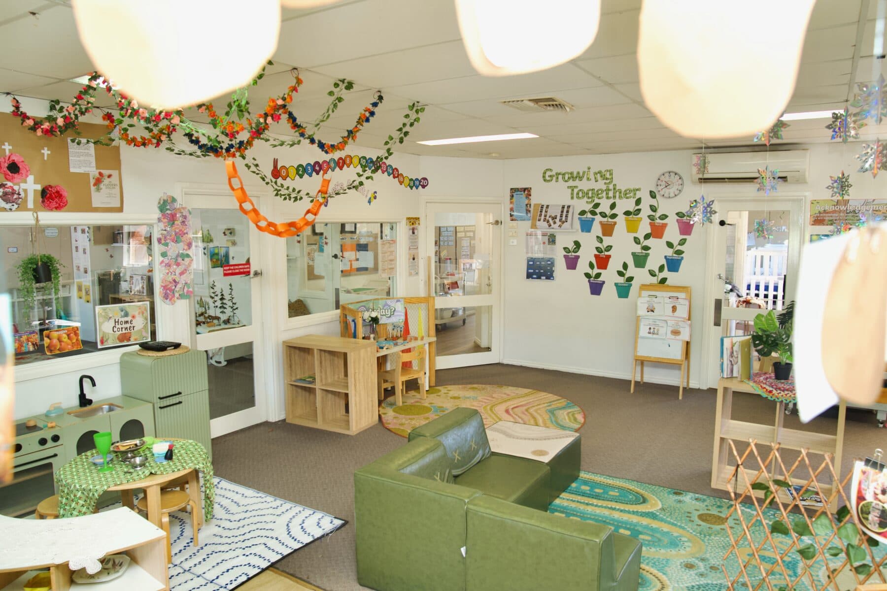A warm, plant-filled room at Guthrie Street Child Care